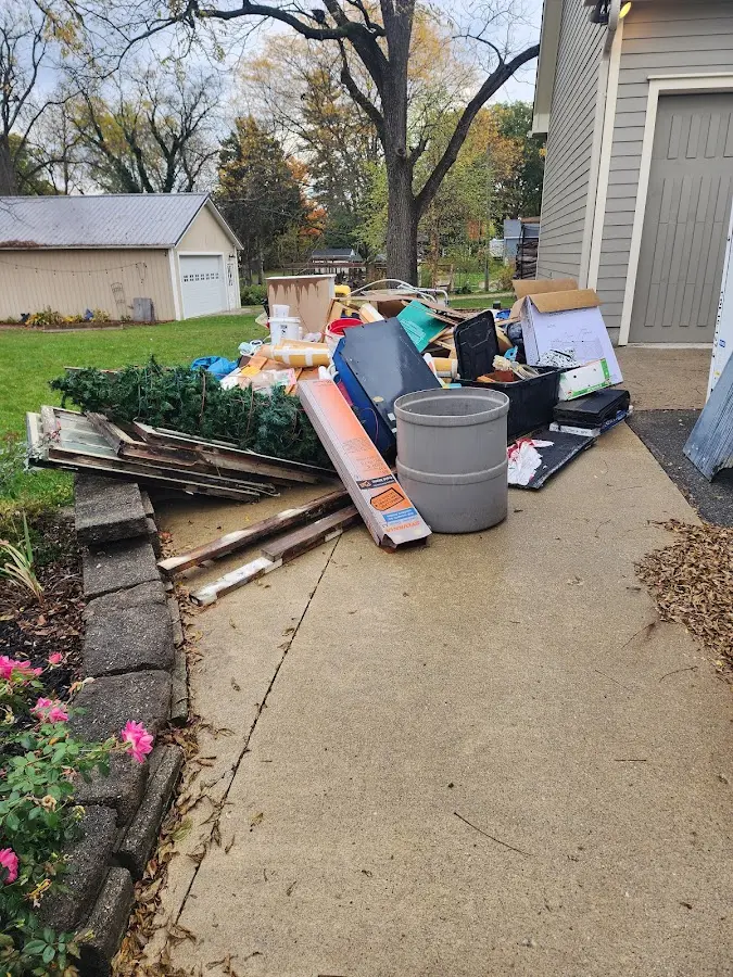Dumpster being loaded with debris for Residential Dumpster Rental in Marina
